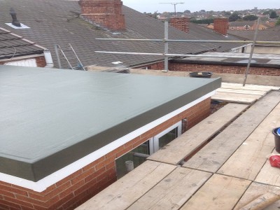 Extension refurbishment of two story fibreglass roof.