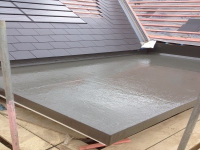Fibreglass roof finishing to tiles.