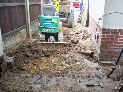 Start of digging out the existing drive ready for drains and concrete floor.