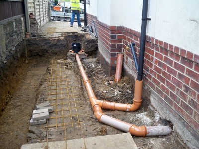 Installation of new drains for utility room and downstairs wc.