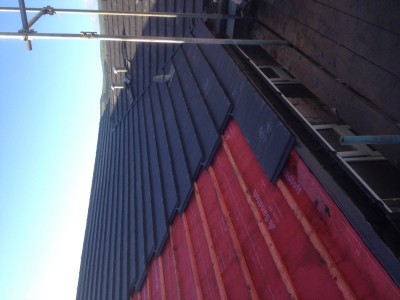 Roofing tiles being installed by our roofers in Sheffield.