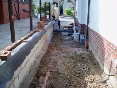 First courses of block work for new external wall of extension.